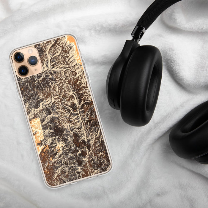 Custom Sequoia National Park Map Phone Case in Ember on Table with Black Headphones