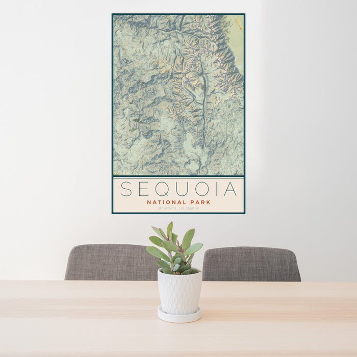 24x36 Sequoia National Park Map Print Portrait Orientation in Woodblock Style Behind 2 Chairs Table and Potted Plant