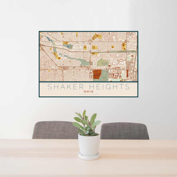 24x36 Shaker Heights Ohio Map Print Lanscape Orientation in Woodblock Style Behind 2 Chairs Table and Potted Plant