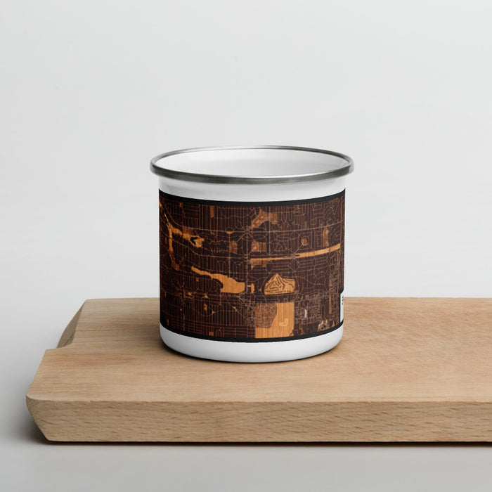 Front View Custom Shaker Heights Ohio Map Enamel Mug in Ember on Cutting Board