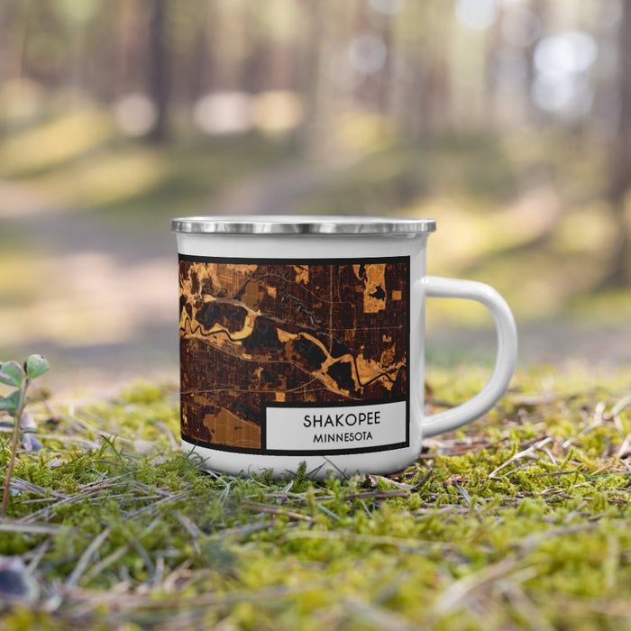 Right View Custom Shakopee Minnesota Map Enamel Mug in Ember on Grass With Trees in Background