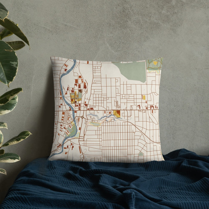 Custom Sharon Pennsylvania Map Throw Pillow in Woodblock on Bedding Against Wall
