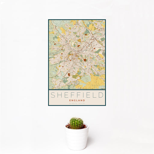 12x18 Sheffield England Map Print Portrait Orientation in Woodblock Style With Small Cactus Plant in White Planter