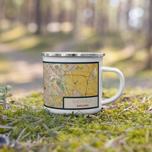 Right View Custom Sheffield England Map Enamel Mug in Woodblock on Grass With Trees in Background