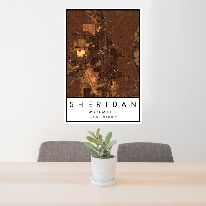 24x36 Sheridan Wyoming Map Print Portrait Orientation in Ember Style Behind 2 Chairs Table and Potted Plant
