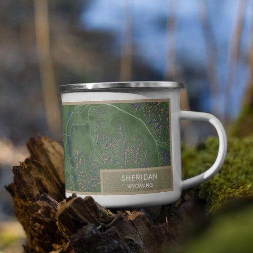 Right View Custom Sheridan Wyoming Map Enamel Mug in Afternoon on Grass With Trees in Background