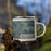 Right View Custom Silver Lake Michigan Map Enamel Mug in Afternoon on Grass With Trees in Background