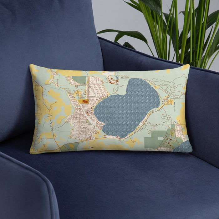 Custom Silver Lake Wisconsin Map Throw Pillow in Woodblock on Blue Colored Chair
