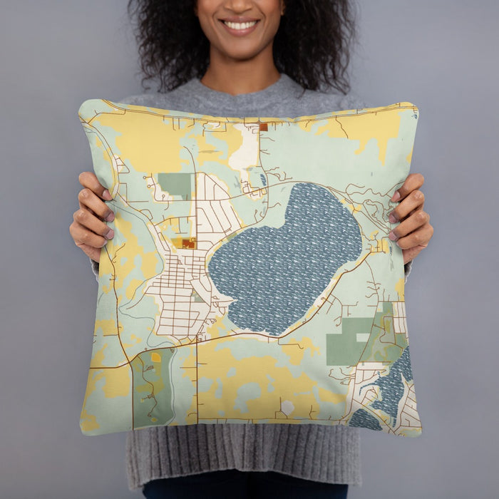 Person holding 18x18 Custom Silver Lake Wisconsin Map Throw Pillow in Woodblock
