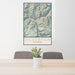 24x36 Silverton Colorado Map Print Portrait Orientation in Woodblock Style Behind 2 Chairs Table and Potted Plant