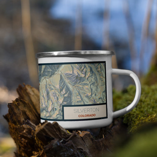 Right View Custom Silverton Colorado Map Enamel Mug in Woodblock on Grass With Trees in Background