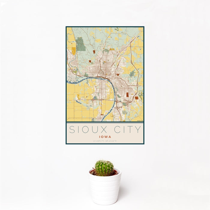 12x18 Sioux City Iowa Map Print Portrait Orientation in Woodblock Style With Small Cactus Plant in White Planter