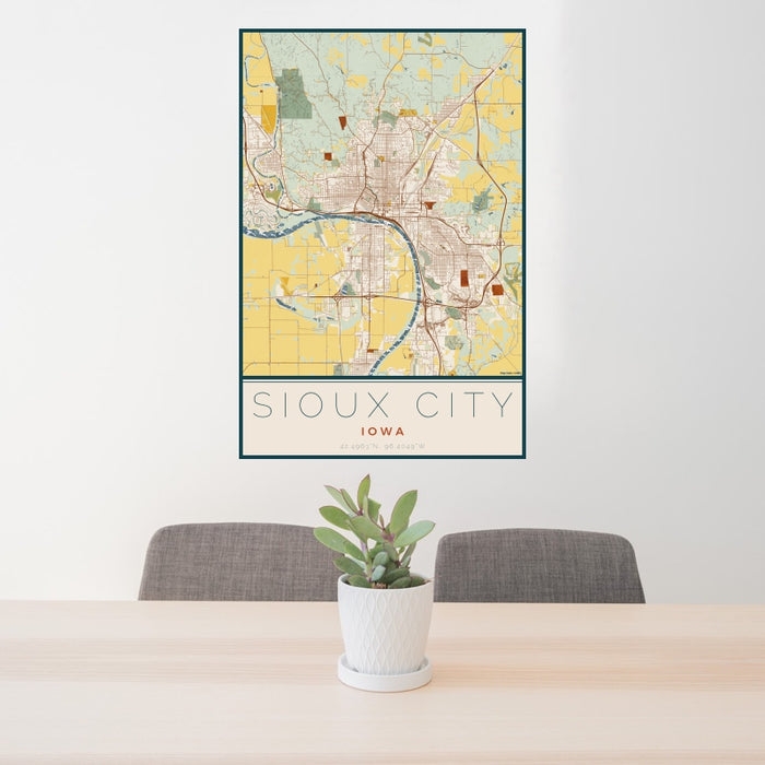 24x36 Sioux City Iowa Map Print Portrait Orientation in Woodblock Style Behind 2 Chairs Table and Potted Plant