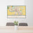 24x36 Sioux City Iowa Map Print Landscape Orientation in Woodblock Style Behind 2 Chairs Table and Potted Plant