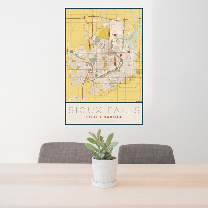 24x36 Sioux Falls South Dakota Map Print Portrait Orientation in Woodblock Style Behind 2 Chairs Table and Potted Plant