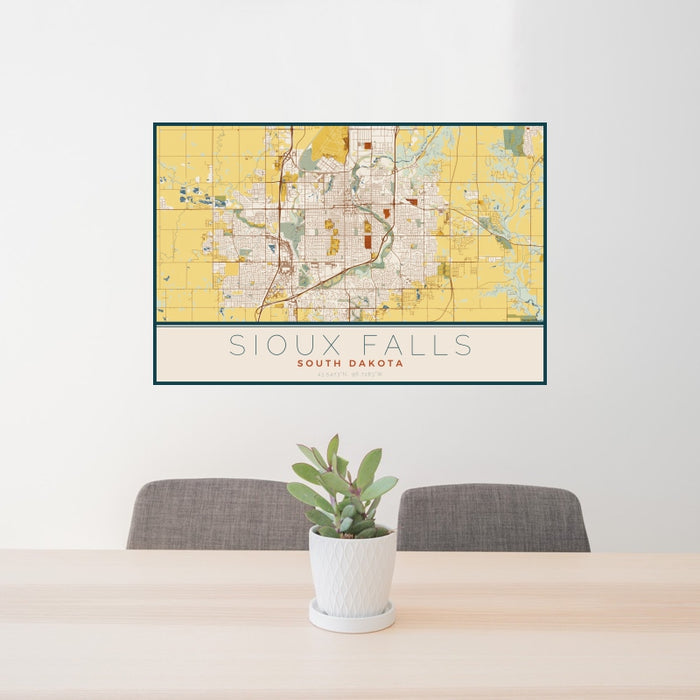 24x36 Sioux Falls South Dakota Map Print Landscape Orientation in Woodblock Style Behind 2 Chairs Table and Potted Plant