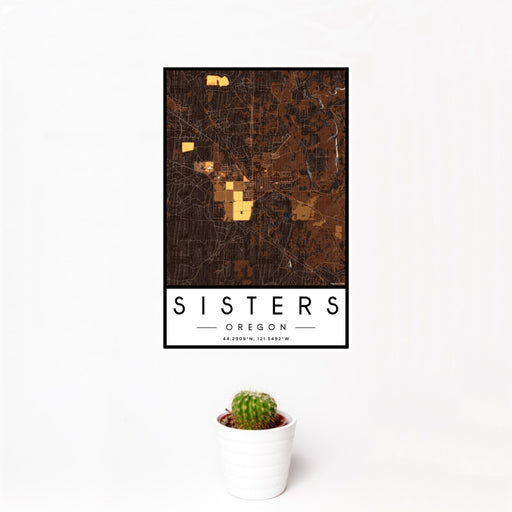 12x18 Sisters Oregon Map Print Portrait Orientation in Ember Style With Small Cactus Plant in White Planter