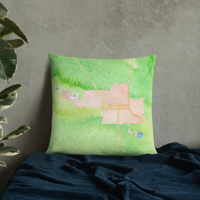 Custom Sisters Oregon Map Throw Pillow in Watercolor on Bedding Against Wall