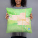 Person holding 18x18 Custom Sisters Oregon Map Throw Pillow in Watercolor