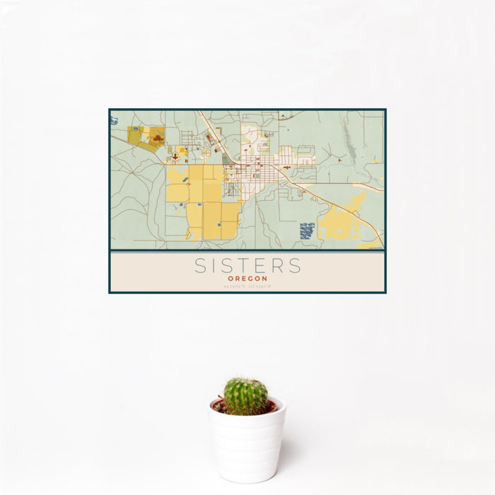 12x18 Sisters Oregon Map Print Landscape Orientation in Woodblock Style With Small Cactus Plant in White Planter