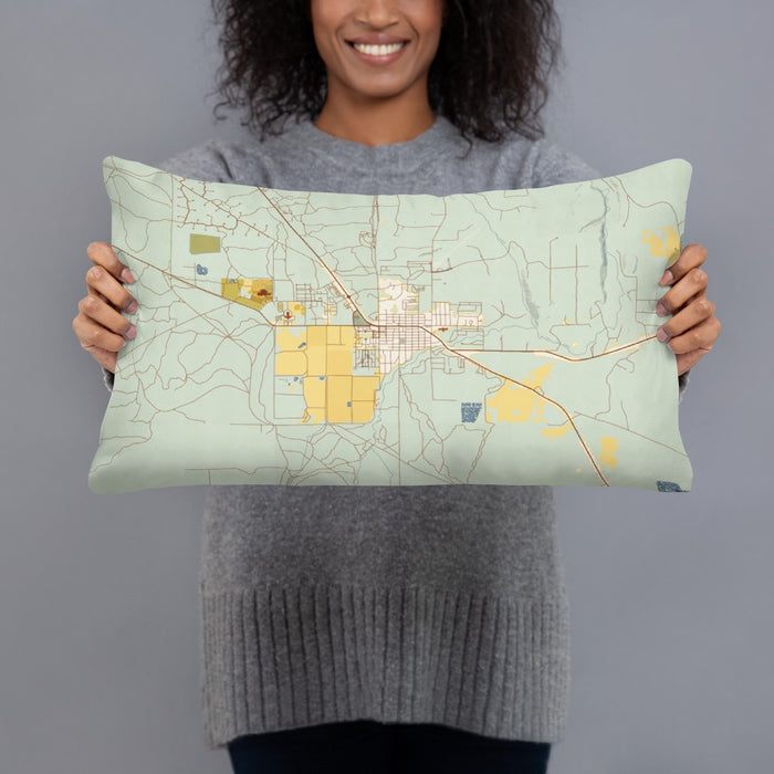 Person holding 20x12 Custom Sisters Oregon Map Throw Pillow in Woodblock