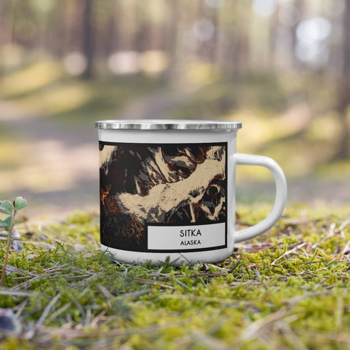 Right View Custom Sitka Alaska Map Enamel Mug in Ember on Grass With Trees in Background