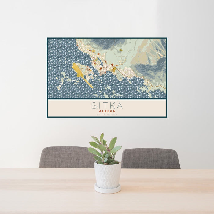 24x36 Sitka Alaska Map Print Landscape Orientation in Woodblock Style Behind 2 Chairs Table and Potted Plant