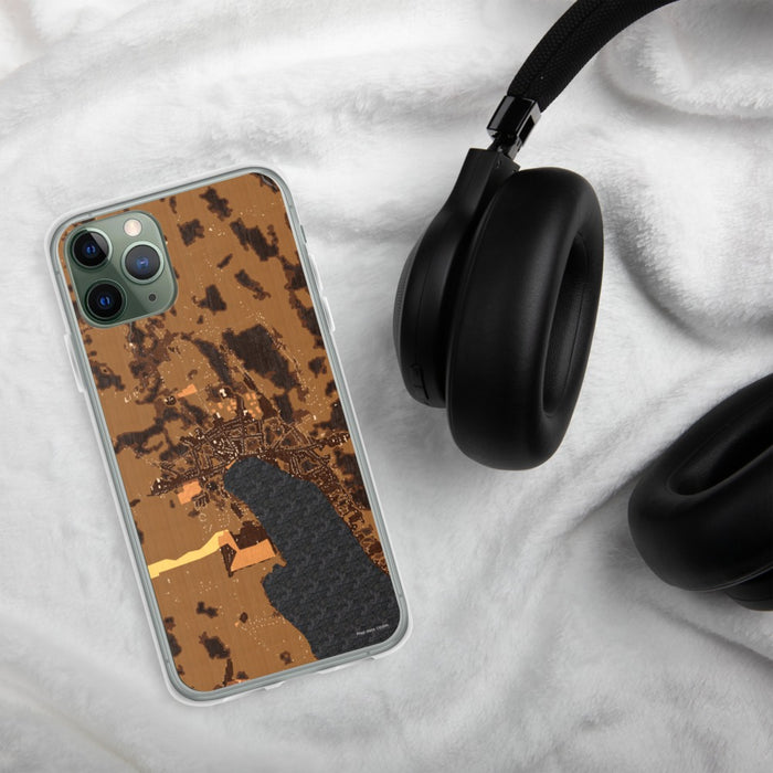 Custom Skaneateles New York Map Phone Case in Ember on Table with Black Headphones