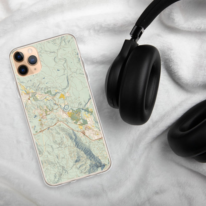 Custom Snoqualmie Washington Map Phone Case in Woodblock on Table with Black Headphones
