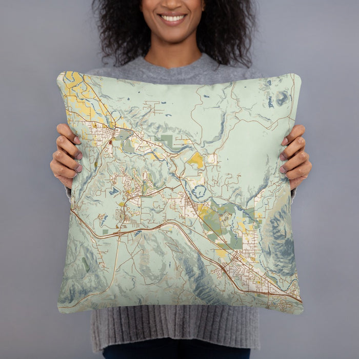 Person holding 18x18 Custom Snoqualmie Washington Map Throw Pillow in Woodblock
