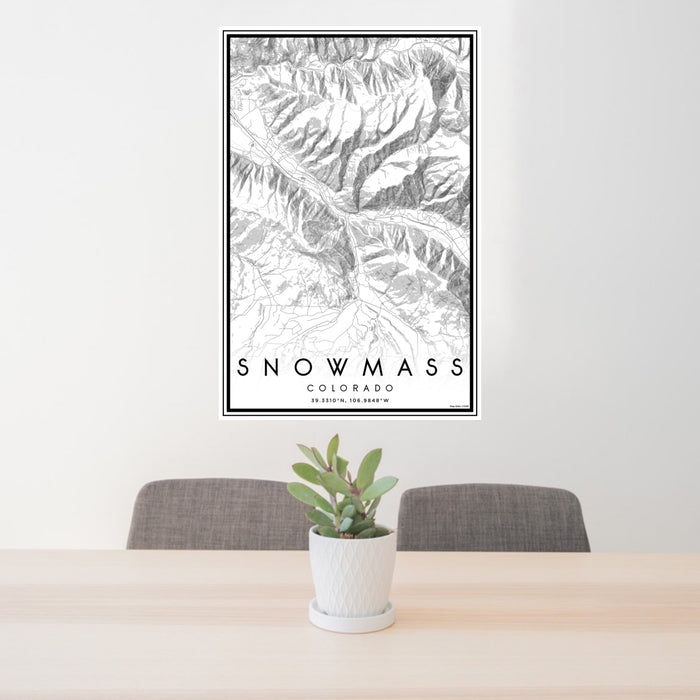 24x36 Snowmass Colorado Map Print Portrait Orientation in Classic Style Behind 2 Chairs Table and Potted Plant