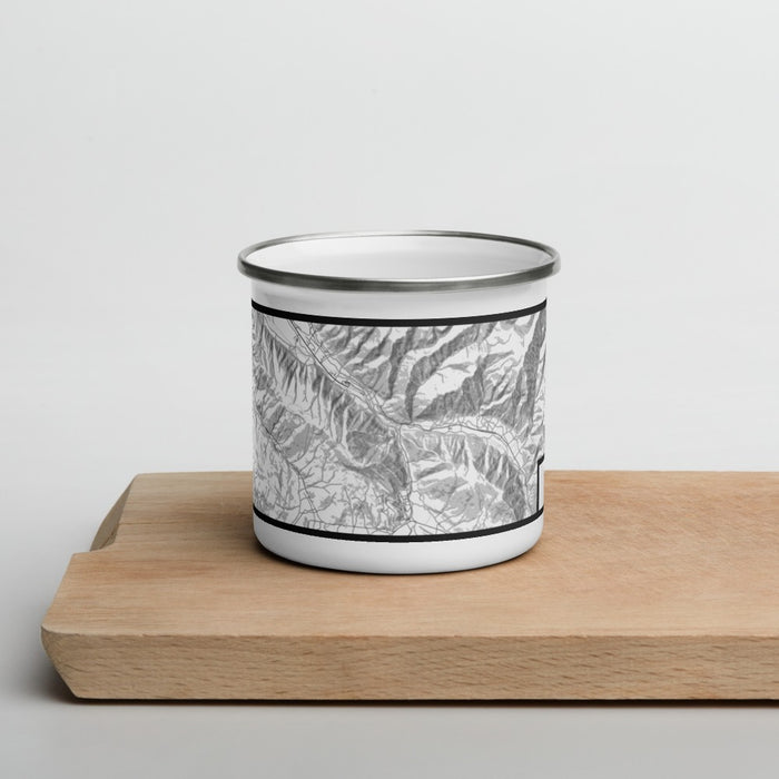 Front View Custom Snowmass Colorado Map Enamel Mug in Classic on Cutting Board