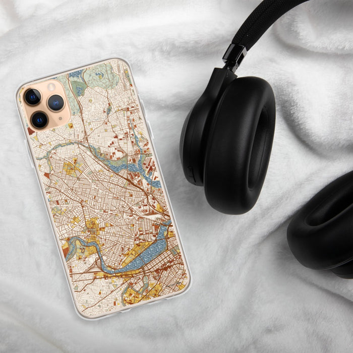 Custom Somerville Massachusetts Map Phone Case in Woodblock on Table with Black Headphones