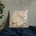 Custom Somerville Massachusetts Map Throw Pillow in Woodblock on Bedding Against Wall
