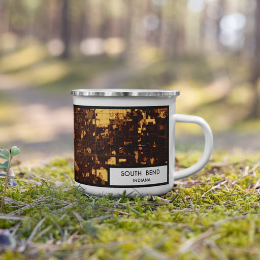 Right View Custom South Bend Indiana Map Enamel Mug in Ember on Grass With Trees in Background