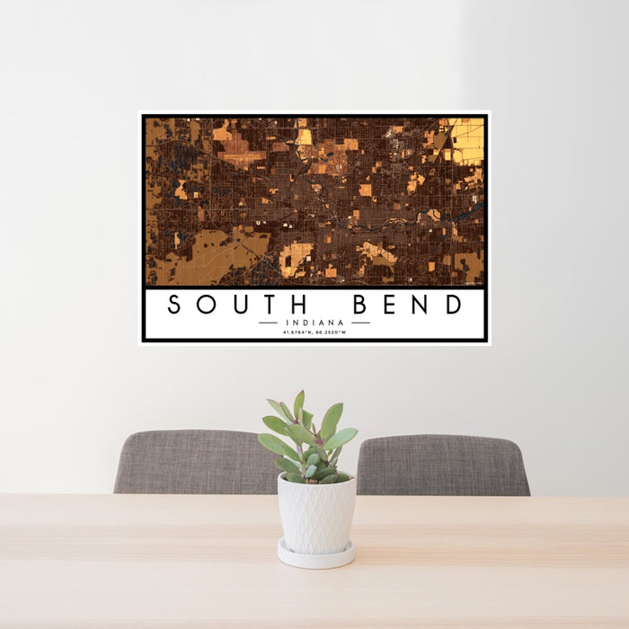 24x36 South Bend Indiana Map Print Landscape Orientation in Ember Style Behind 2 Chairs Table and Potted Plant