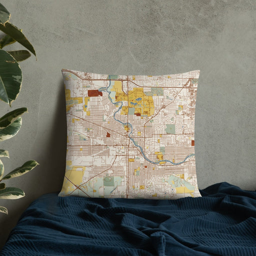 Custom South Bend Indiana Map Throw Pillow in Woodblock on Bedding Against Wall