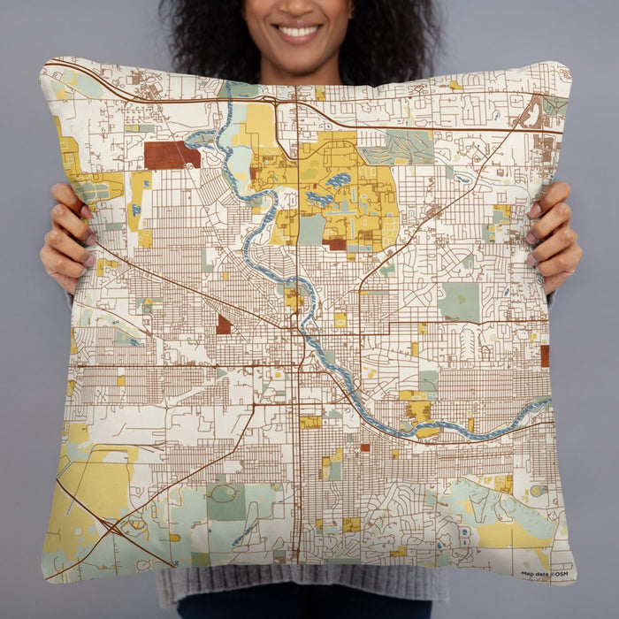 Person holding 22x22 Custom South Bend Indiana Map Throw Pillow in Woodblock
