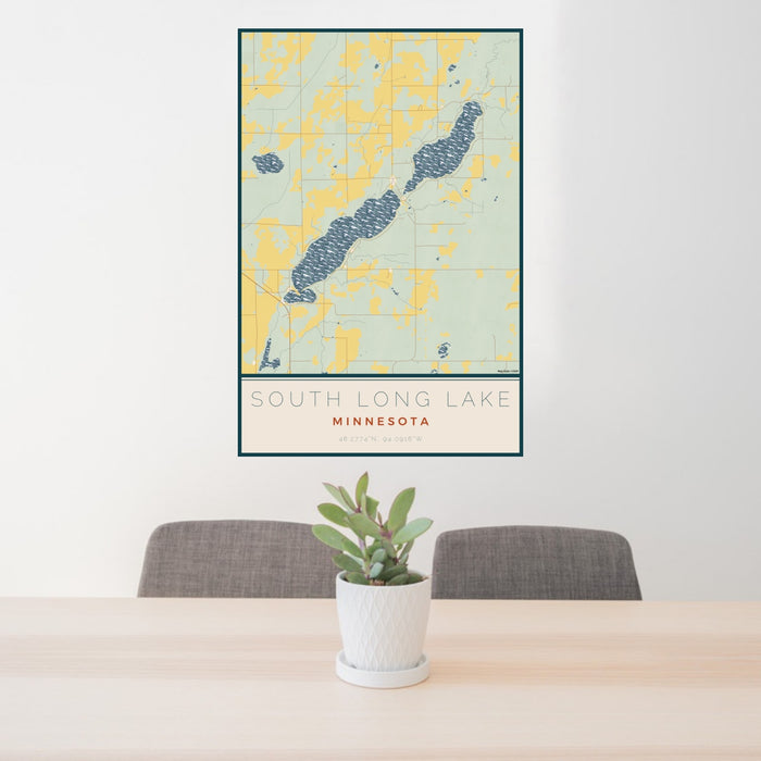 24x36 South Long Lake Minnesota Map Print Portrait Orientation in Woodblock Style Behind 2 Chairs Table and Potted Plant