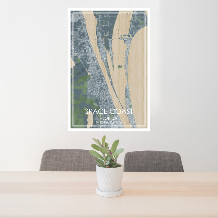 24x36 Space Coast Florida Map Print Portrait Orientation in Afternoon Style Behind 2 Chairs Table and Potted Plant