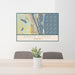24x36 Space Coast Florida Map Print Lanscape Orientation in Woodblock Style Behind 2 Chairs Table and Potted Plant