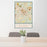 24x36 Spartanburg South Carolina Map Print Portrait Orientation in Woodblock Style Behind 2 Chairs Table and Potted Plant