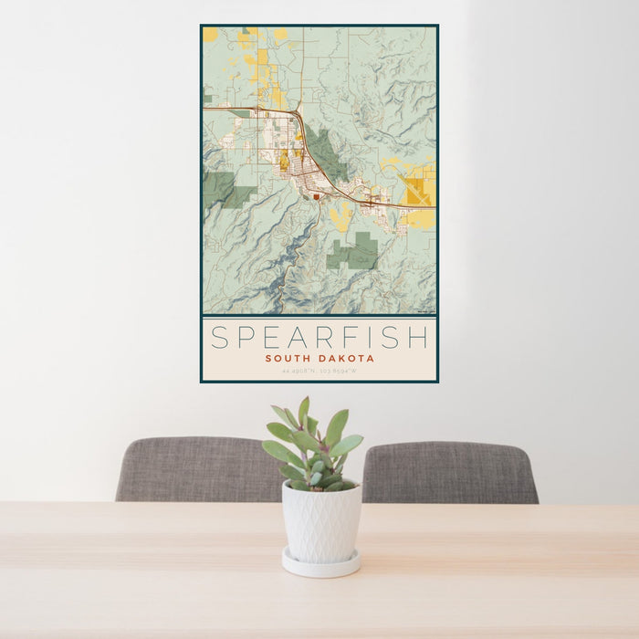 24x36 Spearfish South Dakota Map Print Portrait Orientation in Woodblock Style Behind 2 Chairs Table and Potted Plant