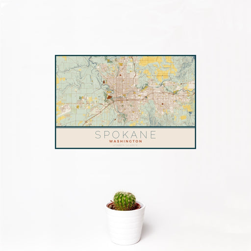 12x18 Spokane Washington Map Print Landscape Orientation in Woodblock Style With Small Cactus Plant in White Planter