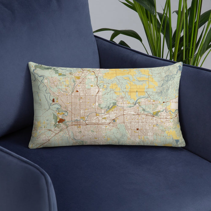 Custom Spokane Washington Map Throw Pillow in Woodblock on Blue Colored Chair
