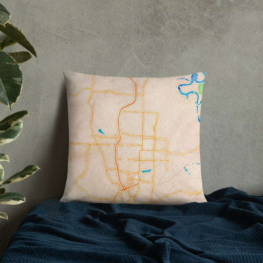 Custom Springdale Arkansas Map Throw Pillow in Watercolor on Bedding Against Wall
