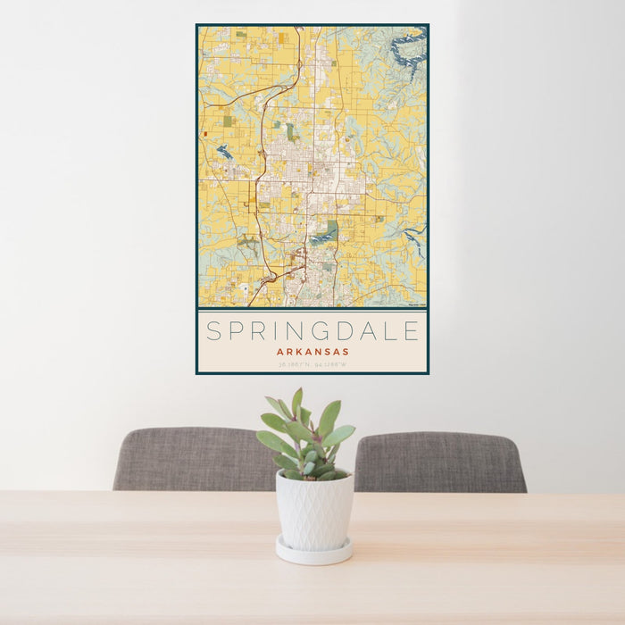 24x36 Springdale Arkansas Map Print Portrait Orientation in Woodblock Style Behind 2 Chairs Table and Potted Plant