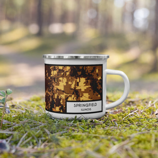 Right View Custom Springfield Illinois Map Enamel Mug in Ember on Grass With Trees in Background