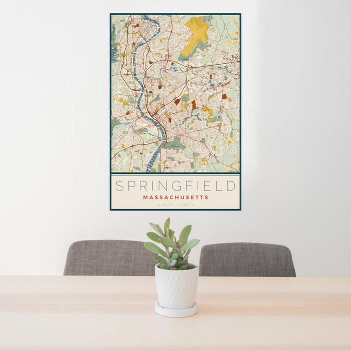 24x36 Springfield Massachusetts Map Print Portrait Orientation in Woodblock Style Behind 2 Chairs Table and Potted Plant