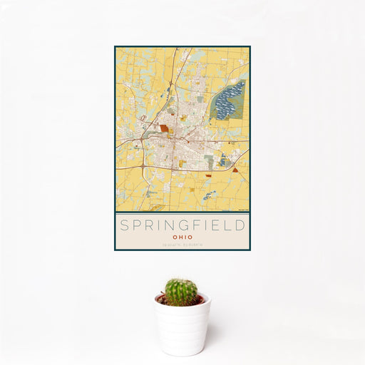 12x18 Springfield Ohio Map Print Portrait Orientation in Woodblock Style With Small Cactus Plant in White Planter